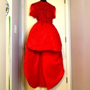 Red asymetrical ball gown